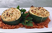 Stuffed courgettes on tomato rice