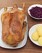 Roast goose with red cabbage and dumplings