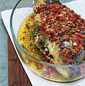 Baked carp with herbs