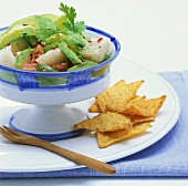 Ceviche (fish salad with avocado and tomatoes)