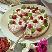 Raspberry cream torte, a piece cut