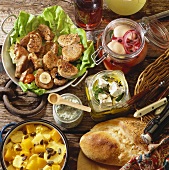 Fried pork fillet slices and other dishes for picnic