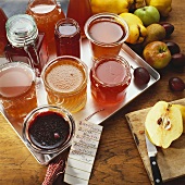 Various types of fruit jelly in jam jars