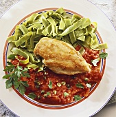 Chicken breast with ribbon pasta and tomato sauce