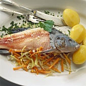 Tench au bleu with vegetables and boiled potatoes