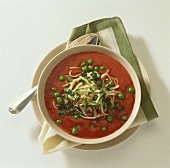 Tomato soup with peas and noodles