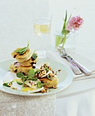 Struwen (yeast pancakes) with goat's cheese, spinach & hazelnuts