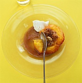 Baked peach with amaretti crumbs and mascarpone
