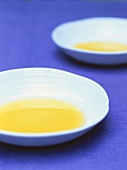Argan oil in two porcelain dishes