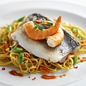 Sea bass with shrimps on egg noodles
