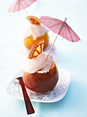 Blood orange ice cream with cocktail umbrella