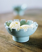 A small bowl of vanilla ice cream