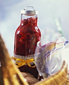 Raspberry compote in a screw-top jar
