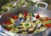 Cockles with artichokes and tomatoes