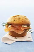 A muffin filled with salmon and dill