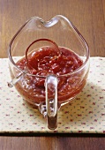 Cumberland sauce in a glass sauce-boat