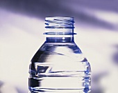 The top part of an opened bottle of water