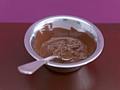 Melting chocolate in a metal dish