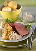 Roasted ham with sauerkraut, dumplings & horseradish sauce