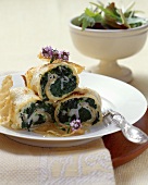Crespelle alla trentina (Pancakes filled with spinach and bacon)