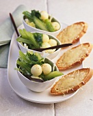 Salad leaves with celery and melon balls