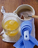 Ginger tea with mandarins and rice syrup, carob milk