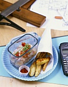 Potato wedges with aubergine and yoghurt dip