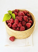 Raspberries in a small basket