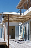 Roofed wooden veranda of holiday home