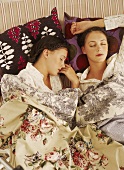 Bed linen & cushions in various patterns & motifs