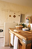 An old kitchen table with eggs, flour and a rolling pin