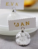 Christmas bauble used as place card holder