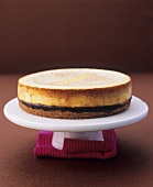 Quince cheesecake on a cake stand