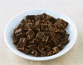 Chopped couverture chocolate in dish