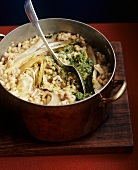 Barley risotto with bacon, beans, chicory and lemon pesto