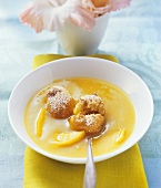 Sweet mango soup with deep-fried rice balls
