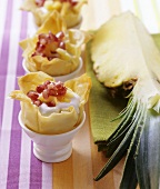 Filo pastry shells with yoghurt cream, pineapple & pomegranate seeds