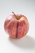 A whole apple (variety: Royal Gala)