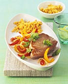 Tuna steak with peppers and millet