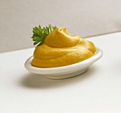 Mustard in a small dish