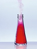 Campari Soda frothing out of opened bottle