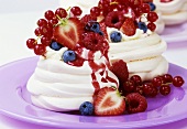 Meringues with fresh berries and berry sauce
