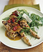 Spicy poussin with rocket salad