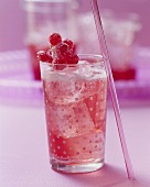 A glass of berry fizz