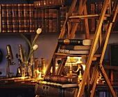 Shelves of antique books and step ladder