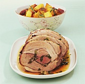 Roast rolled pork with herbs