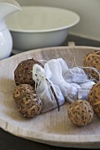 Ornamental spheres on wooden dish