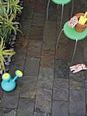 Stools on paved terrace floor