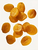 Dried apricots against white background