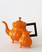 Orange teapot and milk jug